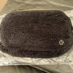 Lululemon everywhere belt bag *fleece in black, gold hardware and symbol
